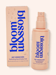 Blush bottle and carton of Get Drenched a hydrating face and body mist.
