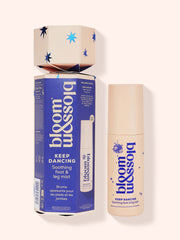 A festive cracker-style gift box from Bloom and Blossom, perfect for the holiday season! The box features a blue and white design with stars and the phrase "Dancing Queen" in bold white lettering. Inside, you'll find a soothing foot and leg mist, ideal for tired and aching limbs after a long day of dancing and celebrating. This charming gift set is sure to bring joy and relaxation to anyone who receives it.