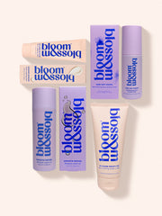 Luxury pregnancy gift set from Bloom and Blossom, featuring a revitalising face and body mist, nourishing body cream, stretch mark oil and multi-tasking balm.