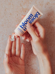 Multi-tasking balm being applied to dry hands to help soothe and moisturise.
