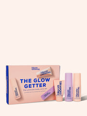 The Glow Getter Gift Set in a cardboard box with sleeve, featuring three mini products.
