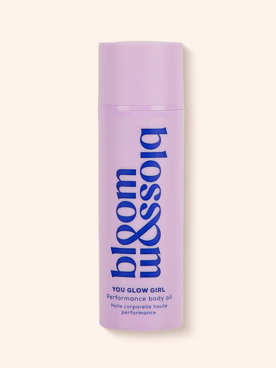 You Glow Girl Performance body oil in purple pump, moisturising body oil to moisturise and even out skin tone.